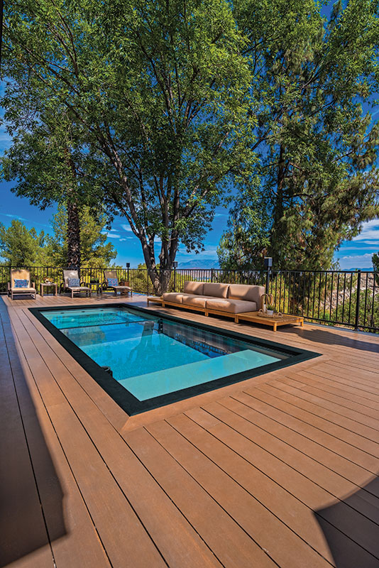 Compact small pool for small yard installed in a residential backyard by Modpools